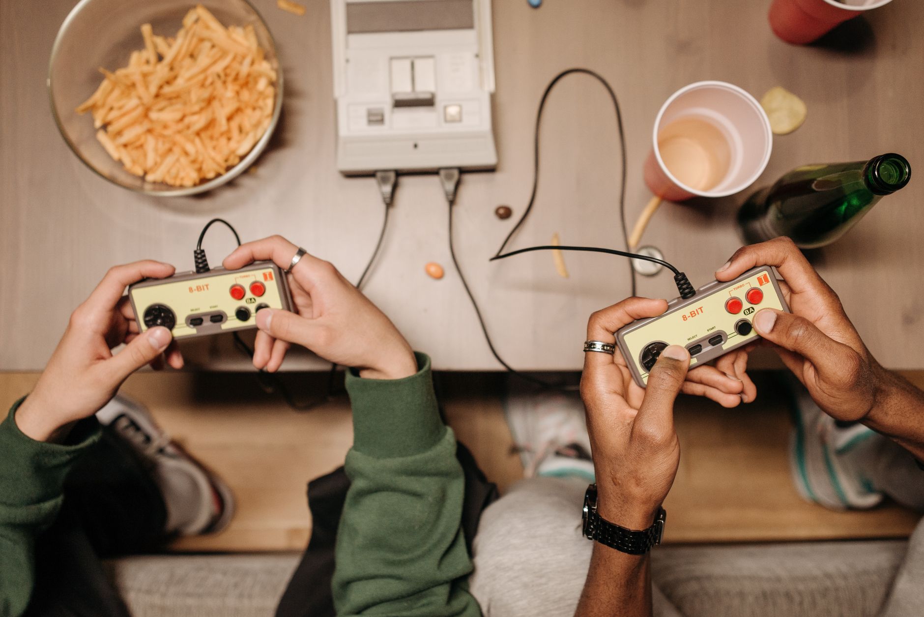 A retro gaming controller and modern setup representing independent gaming desk